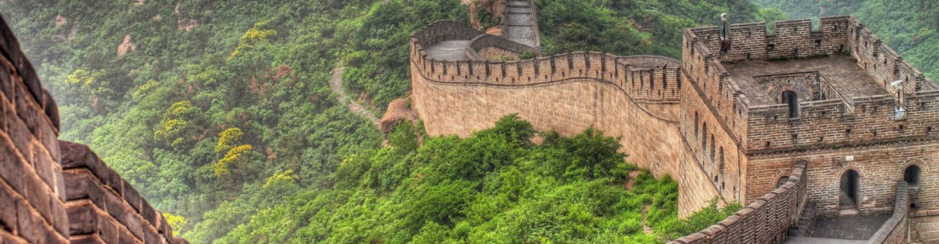 Night tram gliding over cobblestones in Beijing