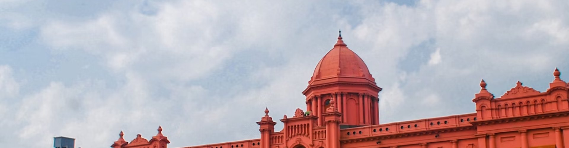 Night tram on cobblestone street in Dhaka