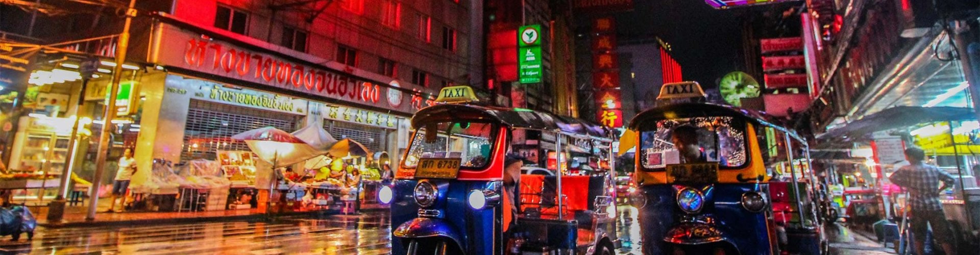 Night tram on cobblestones in Bangkok