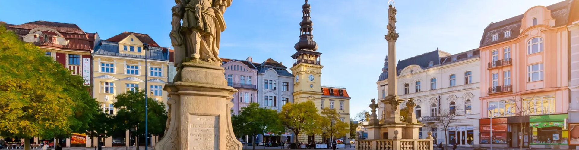 Night tram gliding on cobblestone streets in Ostrava