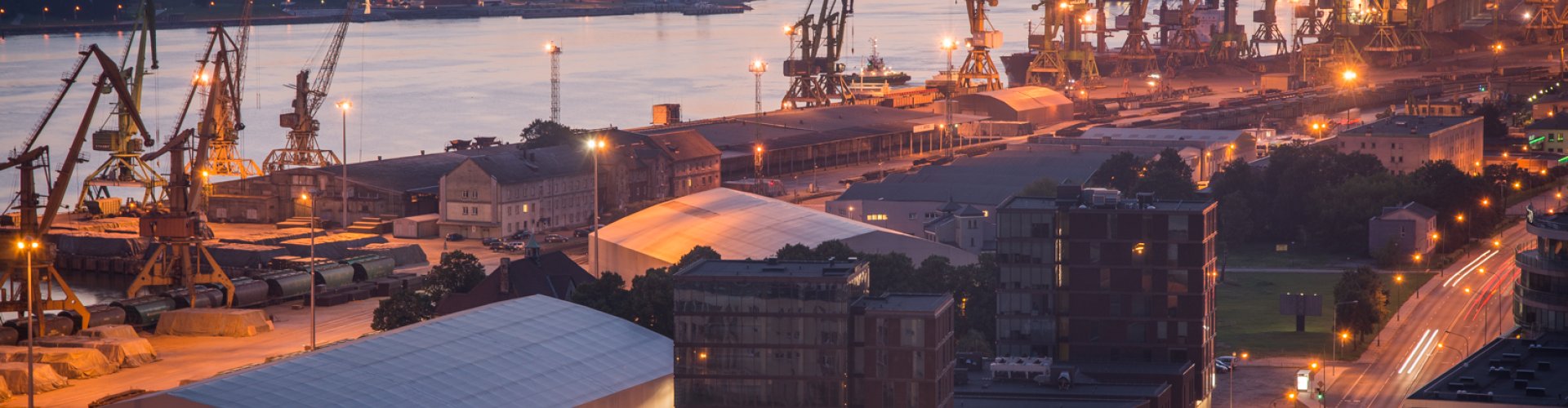 Night tram on cobblestone street in Klaipėda