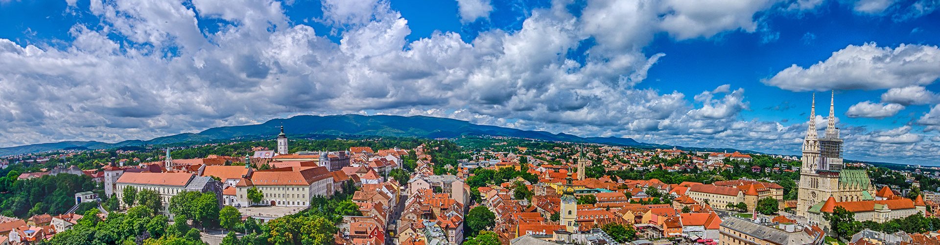 Zagreb tram passing vibrant street scene