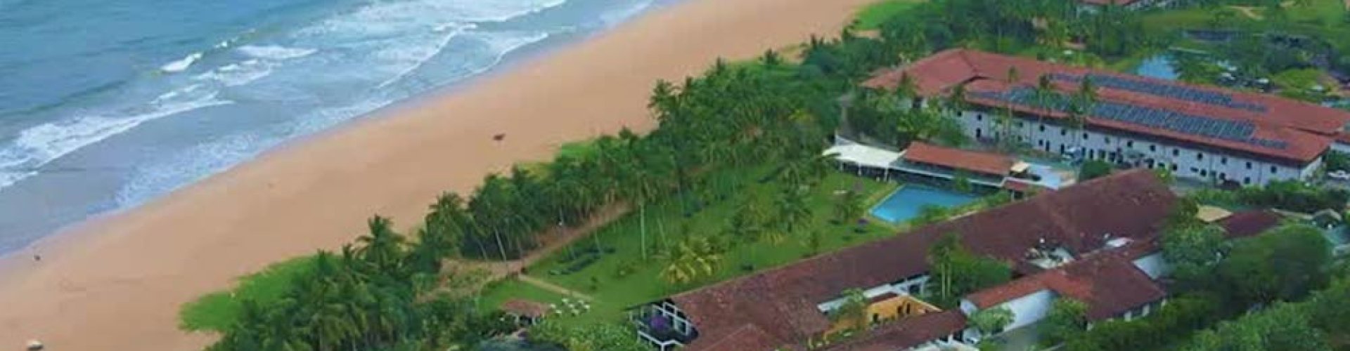 Night tram on cobblestone street in Bentota