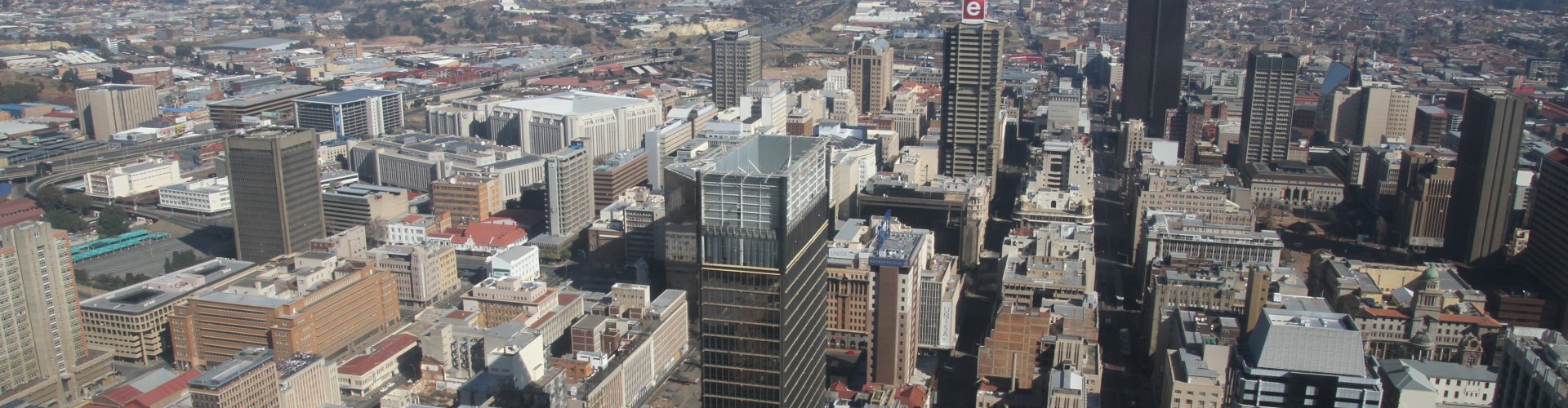 Night tram gliding on Pretoria cobblestone street