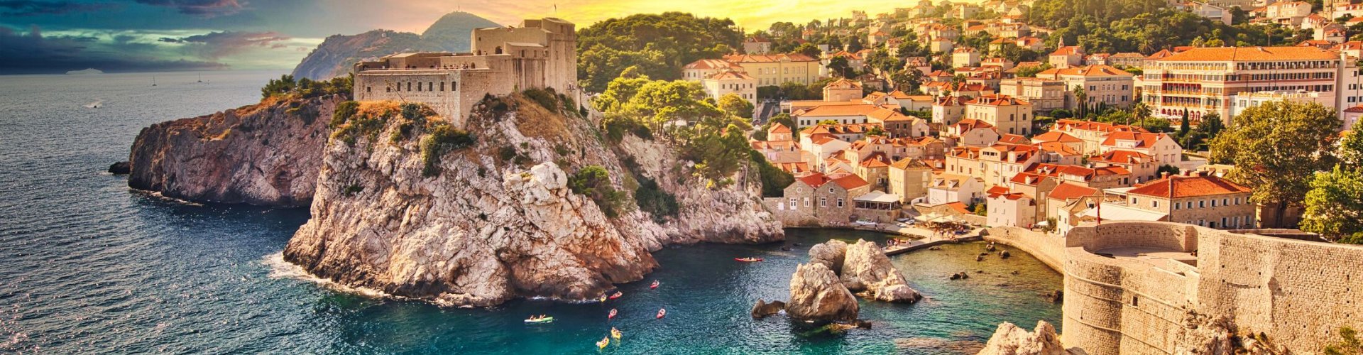 Dubrovnik tram in motion with cityscape