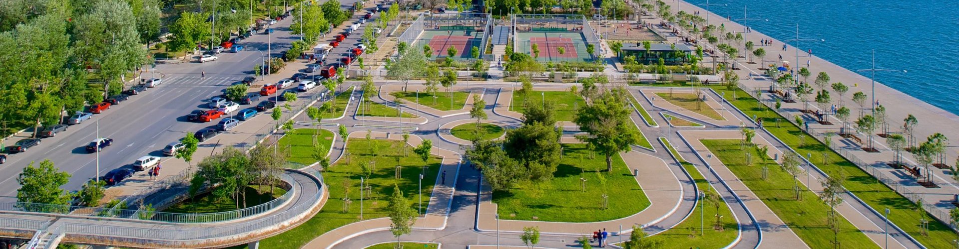 Night tram gliding over cobblestone streets in Thessaloniki