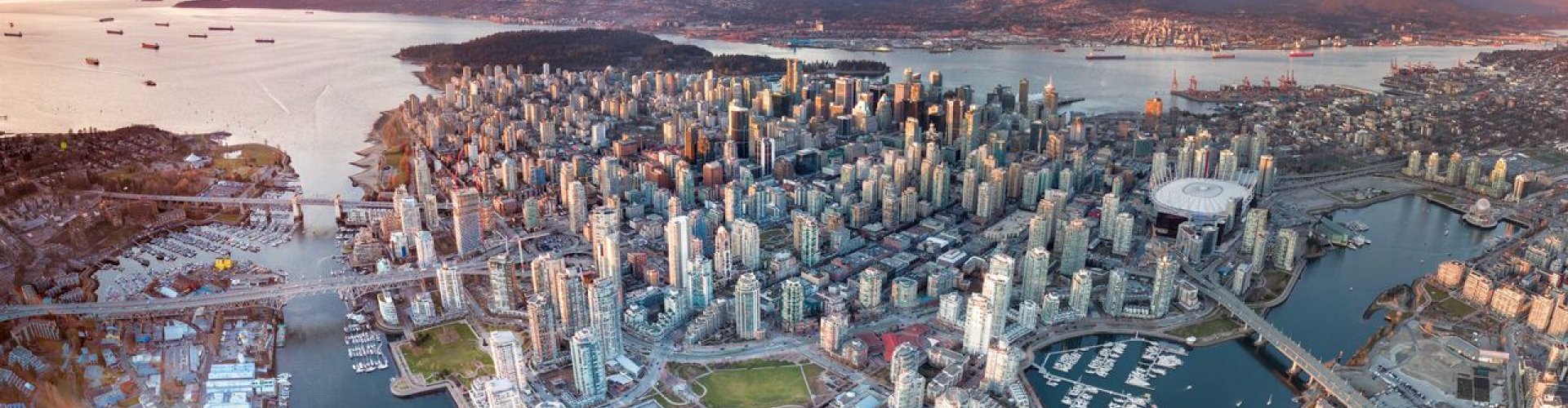 Night tram gliding on cobblestones in Vancouver