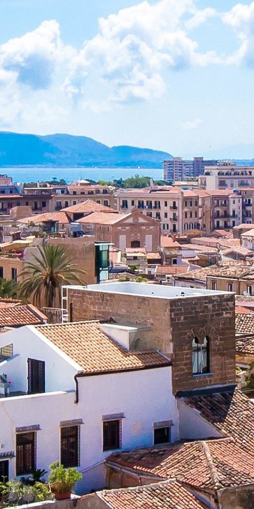 Tram in bright Palermo street