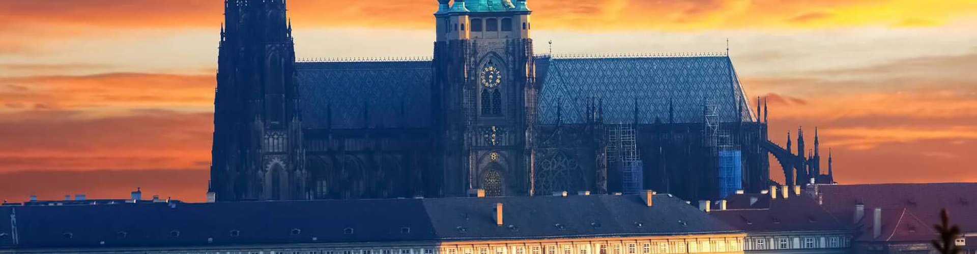 Night tram gliding over cobblestone streets in Prague