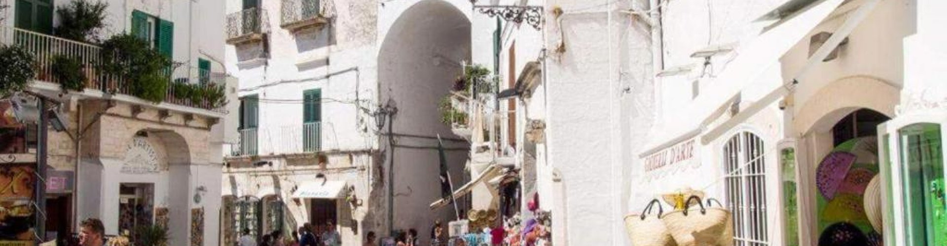 Night tram rolling over Latiano cobblestones