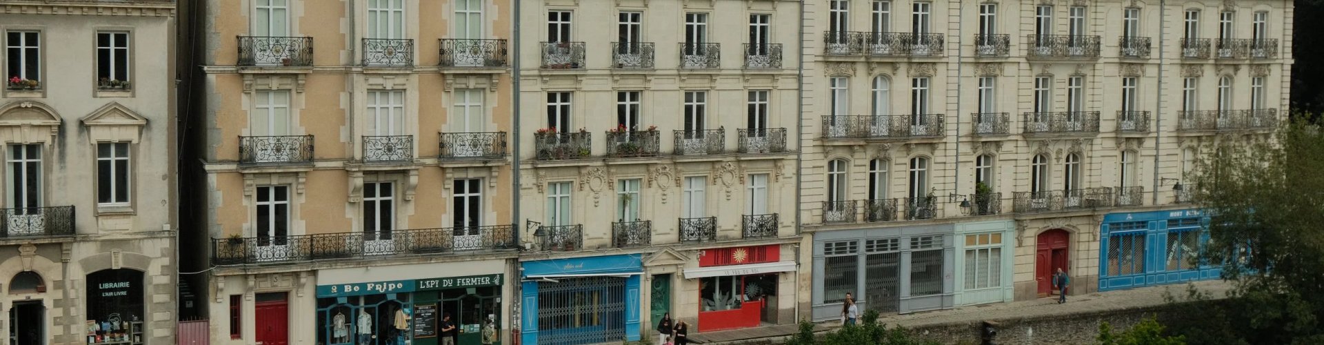Night tram Nantes, FR on cobblestone street
