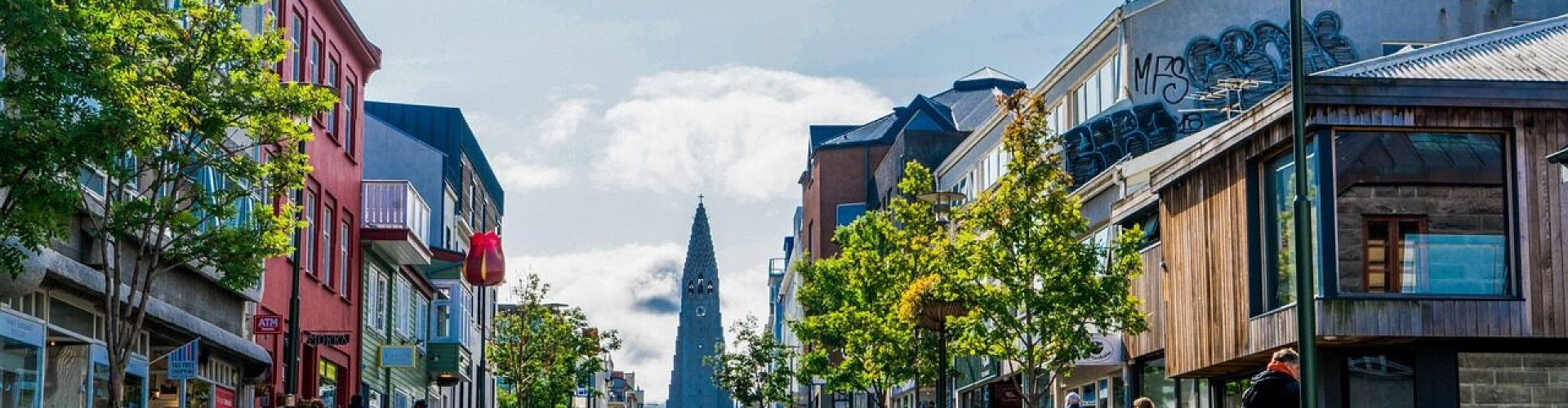 Reykjavík tram and bus stop in lively urban area