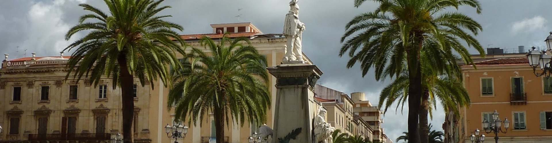Night tram gliding on Sassari's cobblestone street
