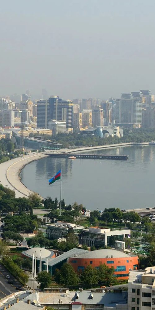 Baku tram running through old city street