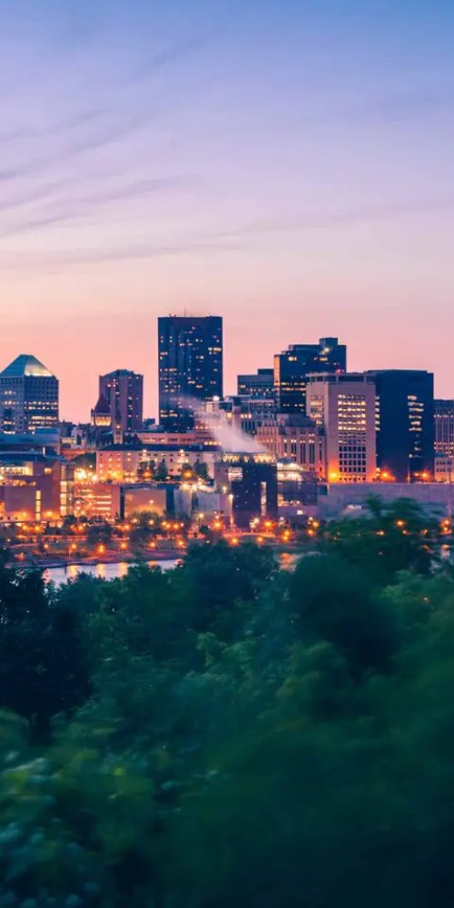 Ramsey tram navigating city streets during off-peak hours