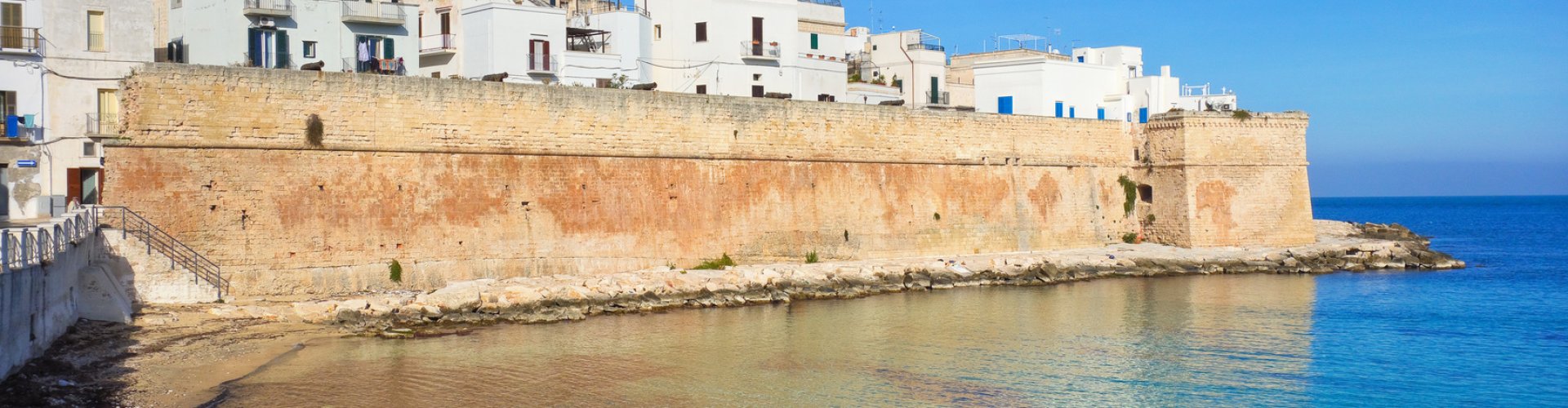 Tram gliding through Monopoli street