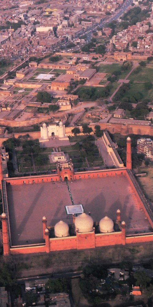 Commuters smiling on metro during off-peak hours