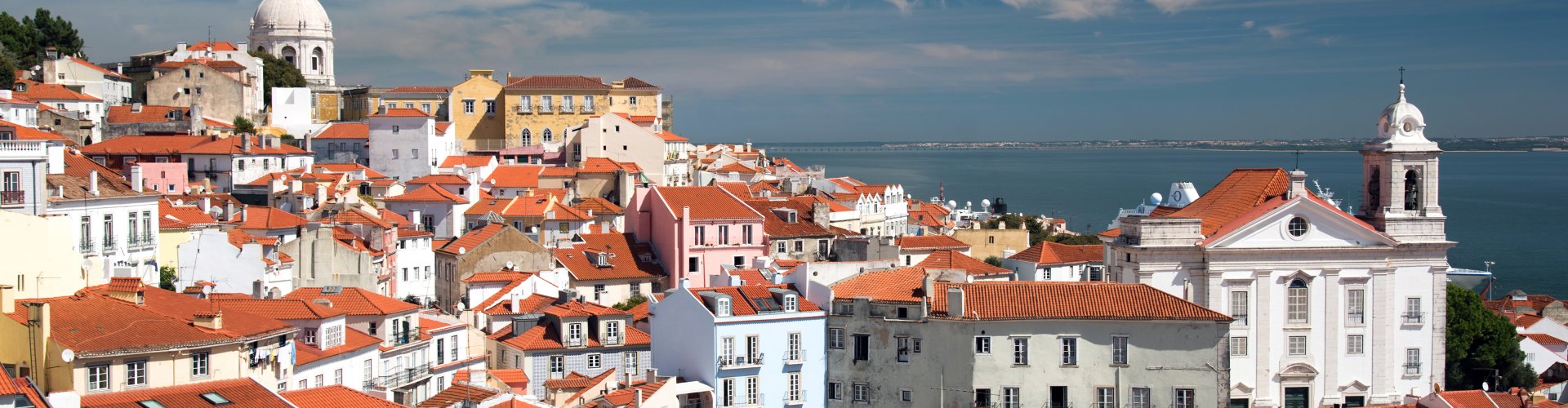 Night tram on Lisbon cobblestone street