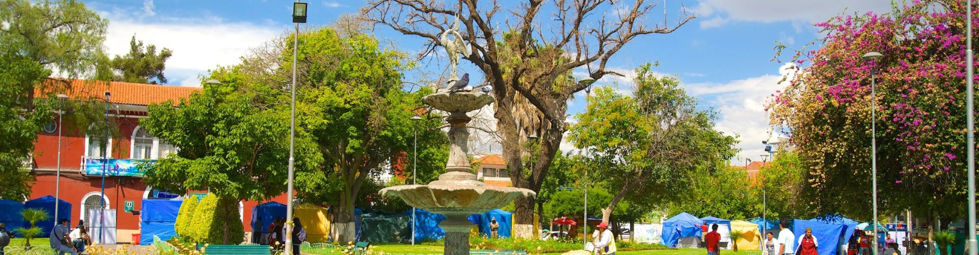 Night tram gliding over cobblestones in Cochabamba