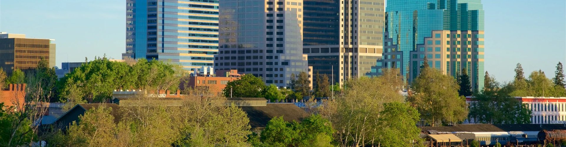 Night tram gliding over cobblestone street in Sacramento
