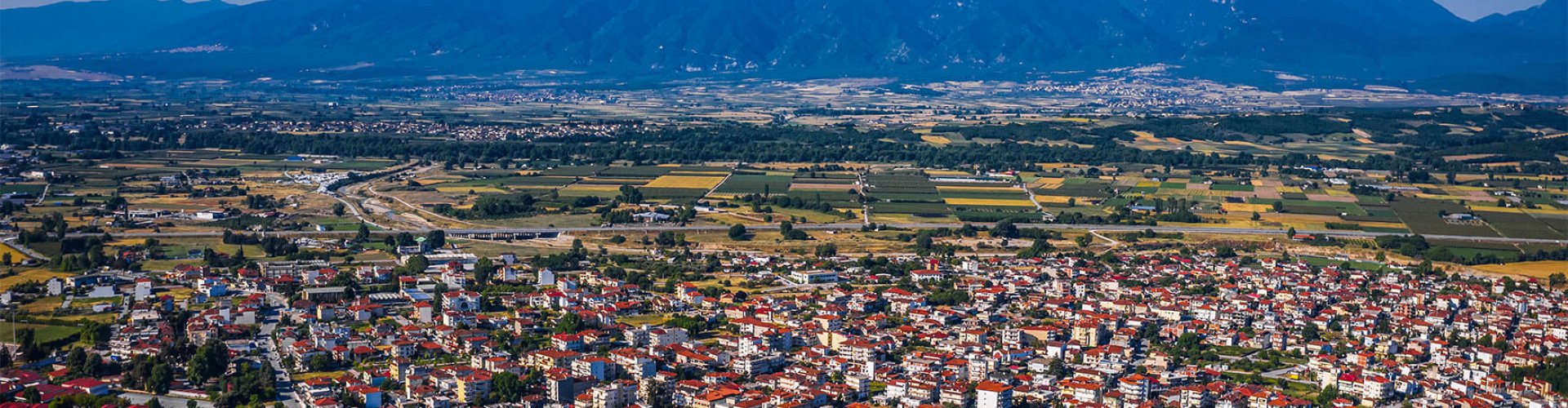 Night tram on cobblestone street in Kateríni