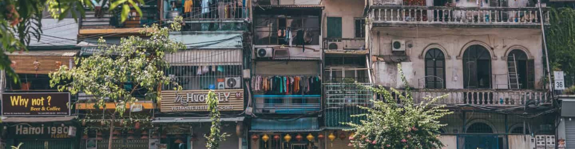 Night tram on cobblestone street in Hanoi