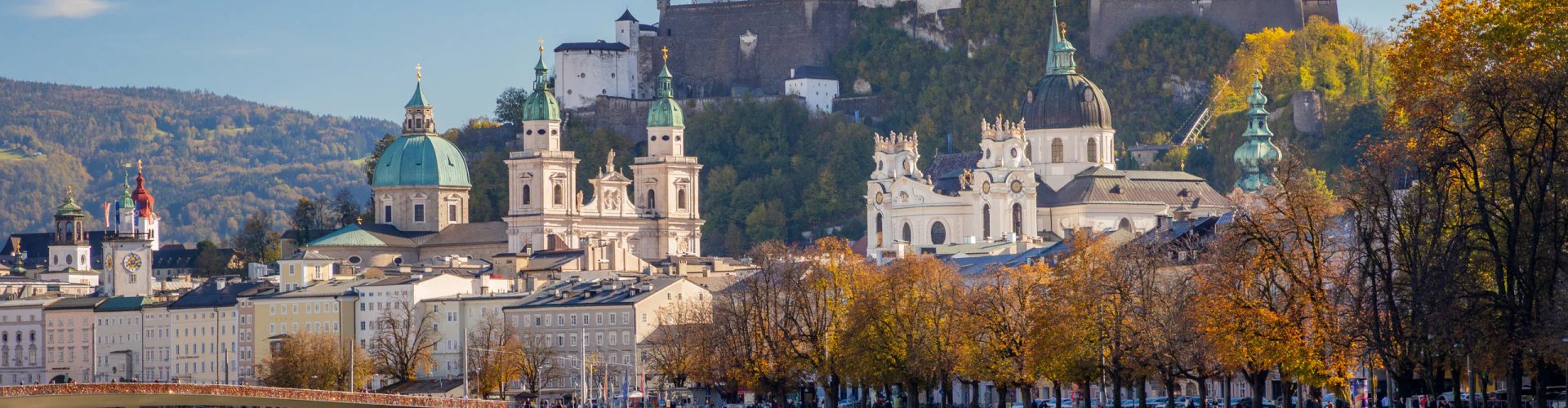 Night tram travelling over Salzburg's historic cobblestones