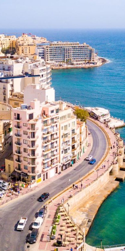 Tram bustling with evening commuters in Malta, MT