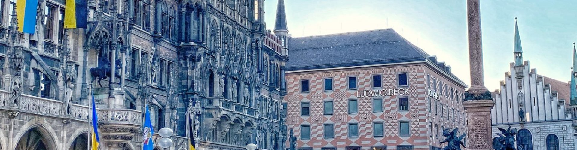 Night tram gliding on Munich's cobblestone street