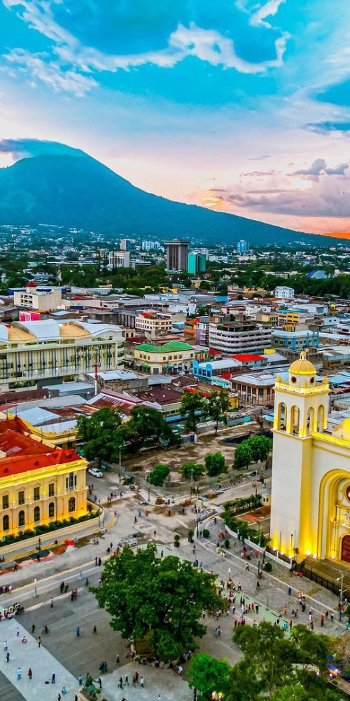 San Salvador tram travelling through a quiet street at dusk