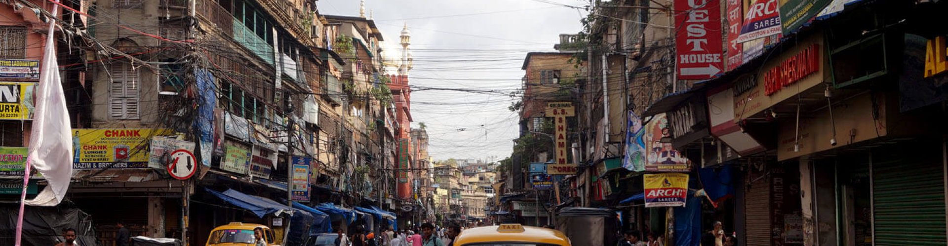 Night tram on cobblestone street Kolkata