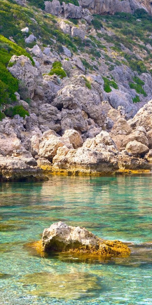 Public transport rider enjoying Faliraki tram during off-peak
