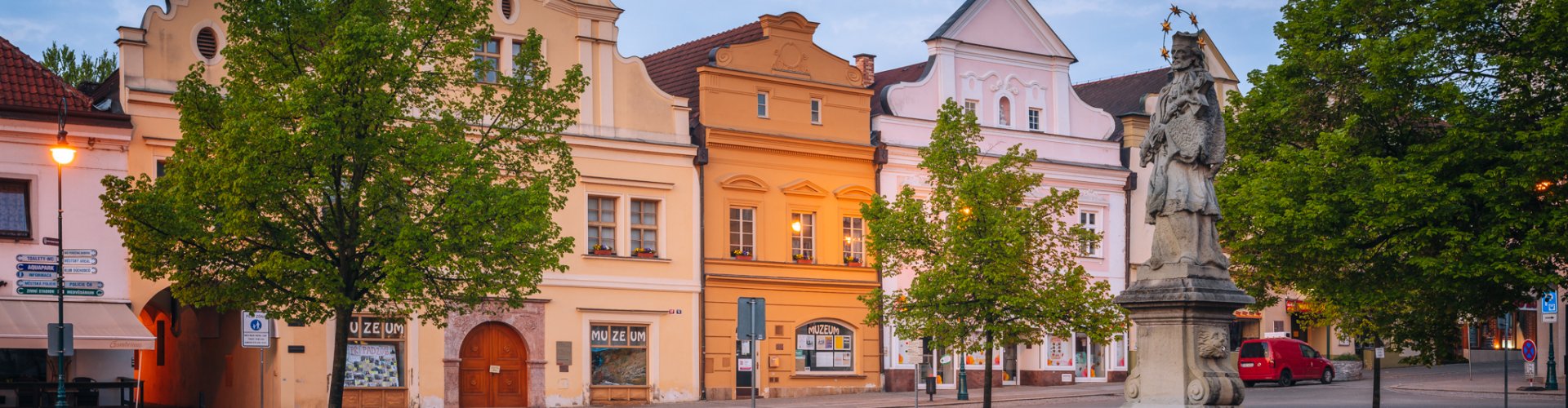 Night tram on cobblestone street in Beroun
