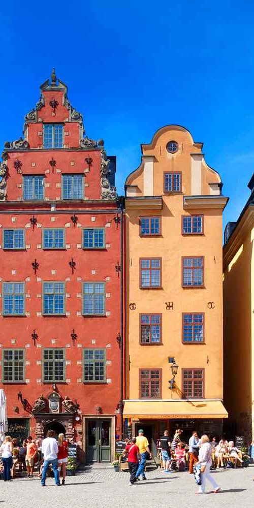 Stockholm tram gliding through quiet evening street