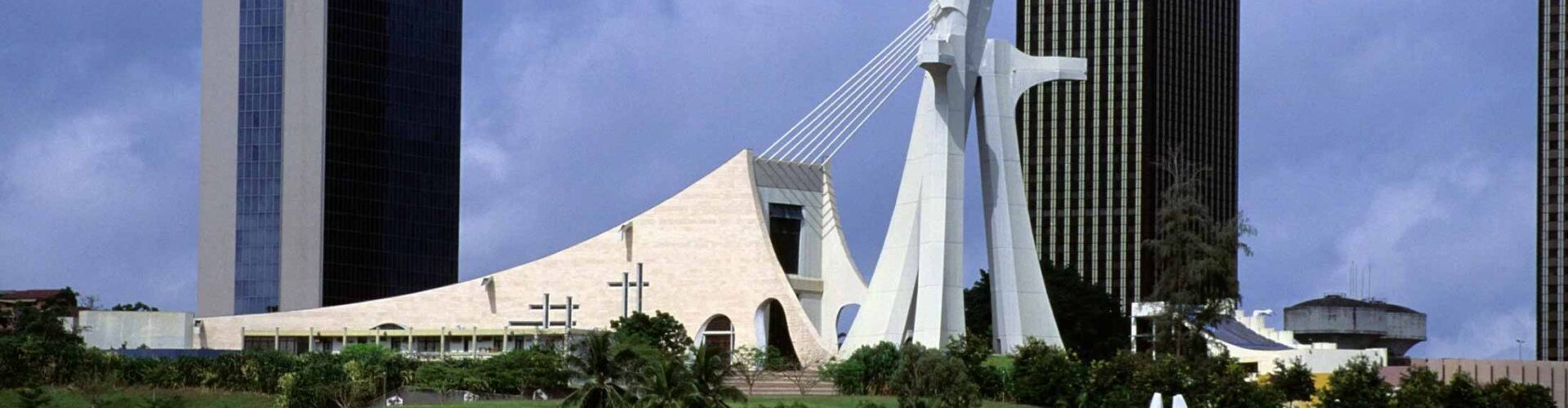 Night tram on cobblestone street in Abidjan