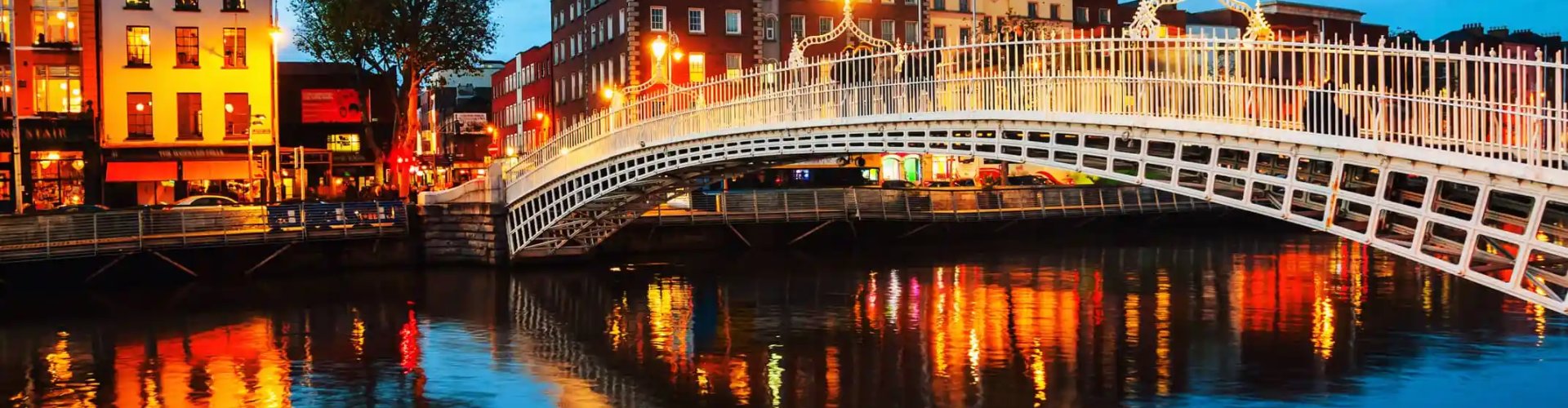 Night tram on cobblestone street in Dublin