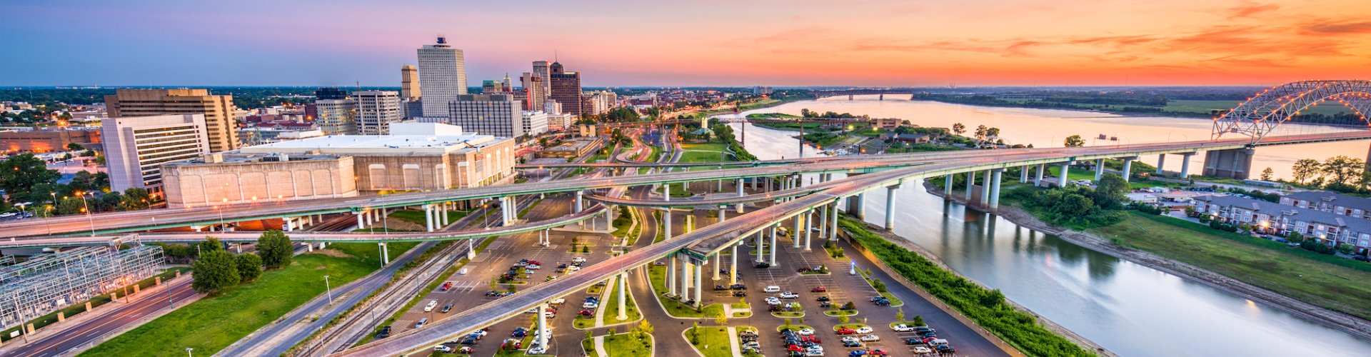 Night tram gliding on cobblestone street in Memphis
