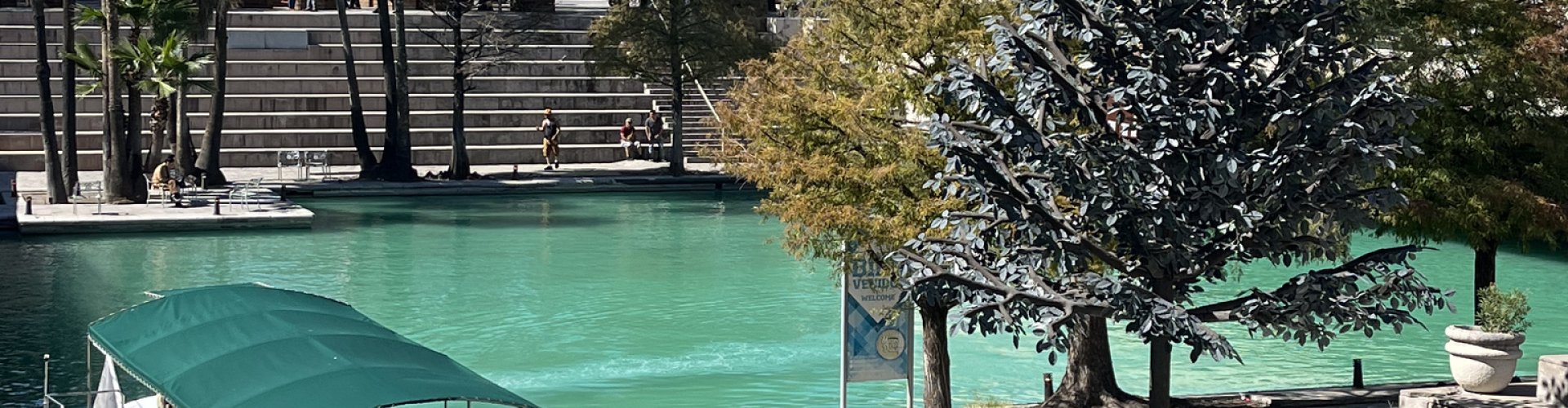 Night tram riding over historic Monterrey cobblestone street