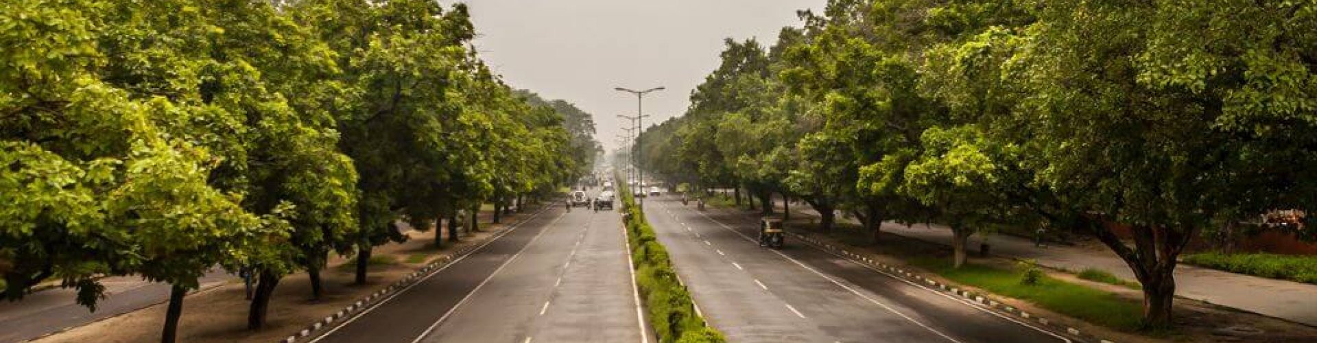 Night tram gliding on Chandīgarh cobblestones
