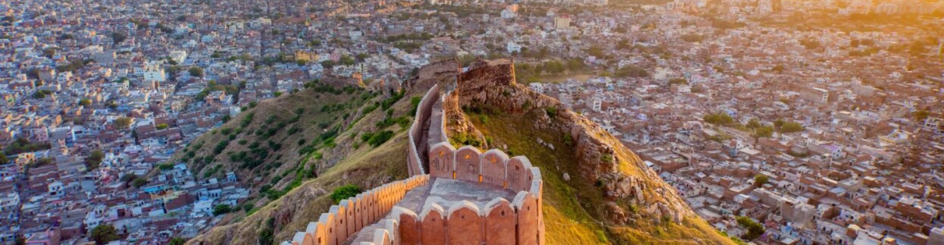 Night tram gliding over Jaipur’s cobblestone streets