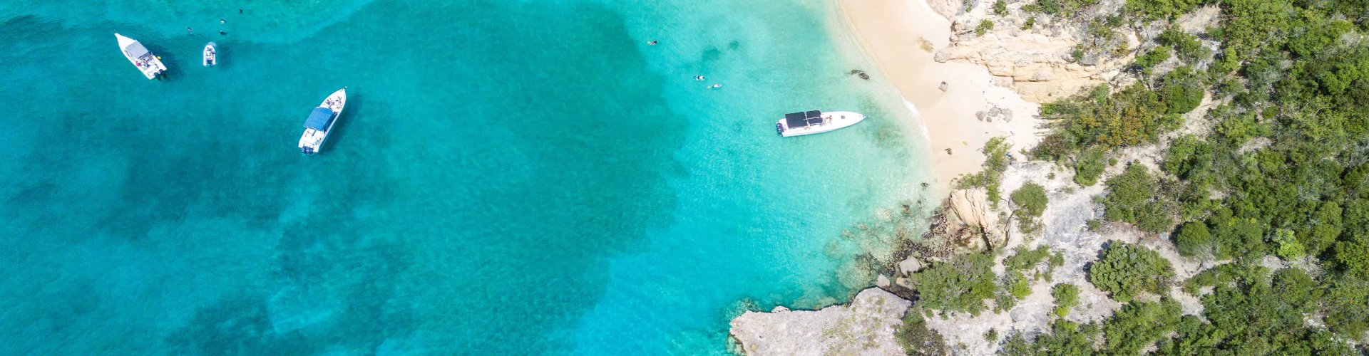 Nighttime tram on cobblestone street in Anguilla