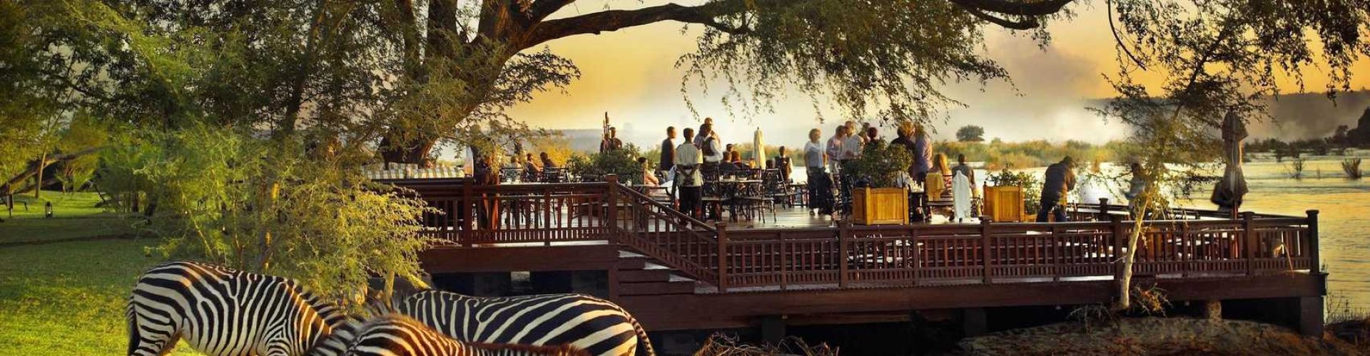 Night tram winding through cobblestone streets in Victoria Falls