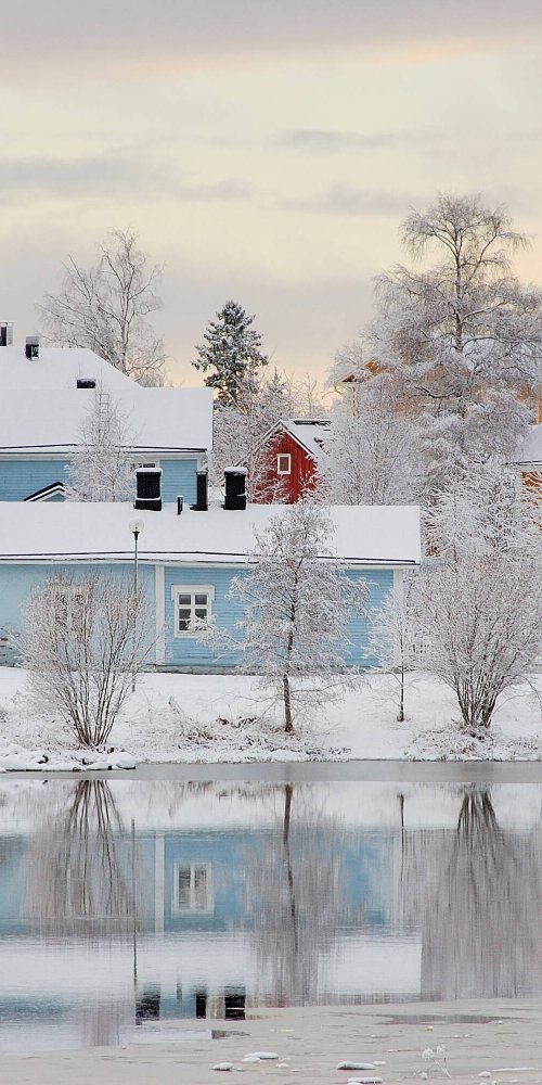 Oulu tram waiting at stop around sunset